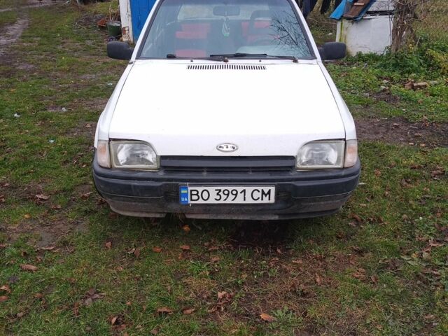 Белый Форд Эскорт, объемом двигателя 1.3 л и пробегом 76 тыс. км за 500 $, фото 1 на Automoto.ua