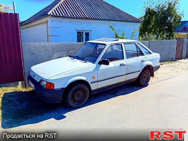 Белый Форд Эскорт, объемом двигателя 1.4 л и пробегом 0 тыс. км за 400 $, фото 1 на Automoto.ua