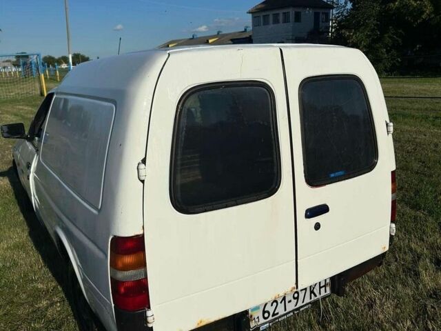 Белый Форд Эскорт, объемом двигателя 1.3 л и пробегом 120 тыс. км за 1000 $, фото 1 на Automoto.ua