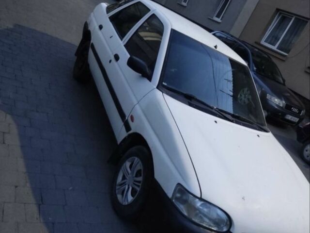 Білий Форд Ескорт, об'ємом двигуна 1.3 л та пробігом 200 тис. км за 946 $, фото 1 на Automoto.ua