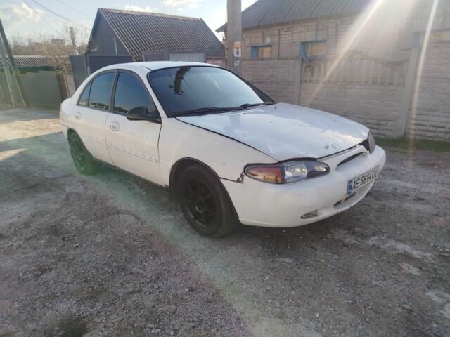 Белый Форд Эскорт, объемом двигателя 2 л и пробегом 100 тыс. км за 677 $, фото 1 на Automoto.ua