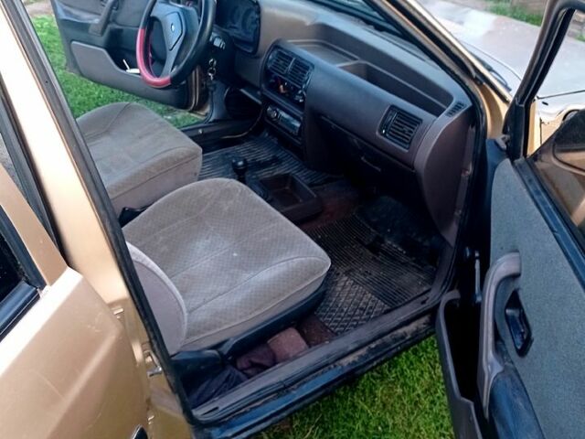 Бежевий Форд Ескорт, об'ємом двигуна 1.3 л та пробігом 0 тис. км за 850 $, фото 1 на Automoto.ua