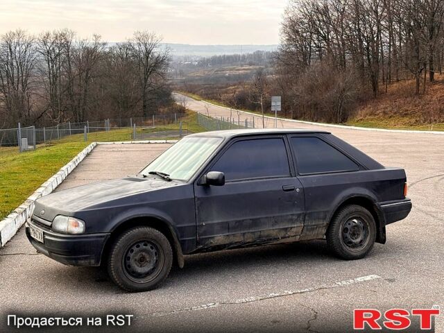 Чорний Форд Ескорт, об'ємом двигуна 1.3 л та пробігом 300 тис. км за 1000 $, фото 1 на Automoto.ua