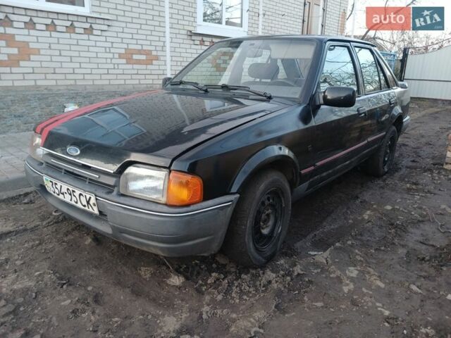Черный Форд Эскорт, объемом двигателя 1.4 л и пробегом 103 тыс. км за 750 $, фото 1 на Automoto.ua
