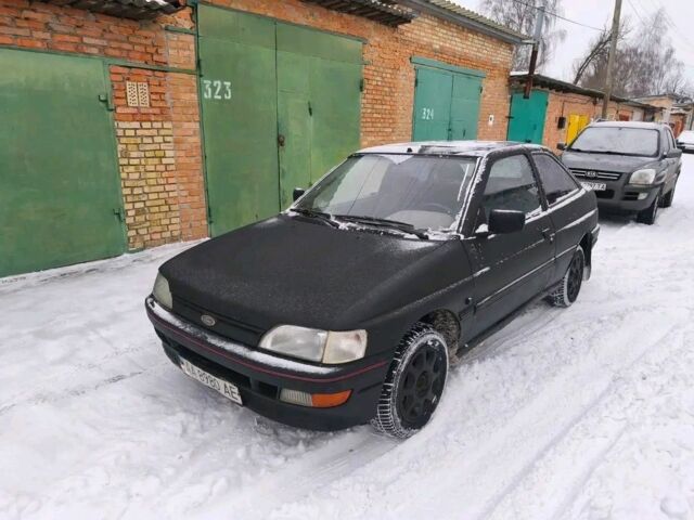 Черный Форд Эскорт, объемом двигателя 1 л и пробегом 350 тыс. км за 452 $, фото 1 на Automoto.ua