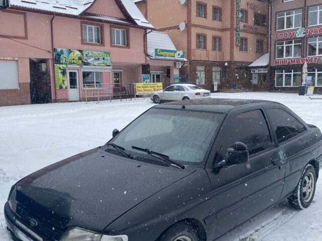 Черный Форд Эскорт, объемом двигателя 1.4 л и пробегом 100 тыс. км за 500 $, фото 1 на Automoto.ua