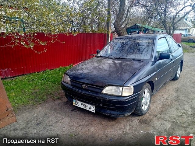 Черный Форд Эскорт, объемом двигателя 1.3 л и пробегом 121 тыс. км за 750 $, фото 1 на Automoto.ua