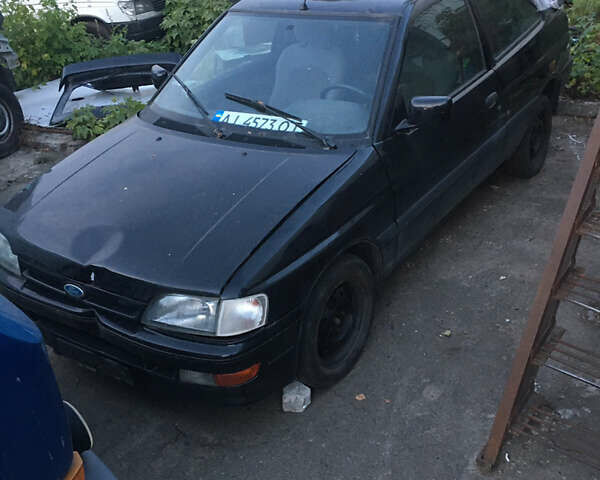Черный Форд Эскорт, объемом двигателя 1.3 л и пробегом 200 тыс. км за 1600 $, фото 1 на Automoto.ua