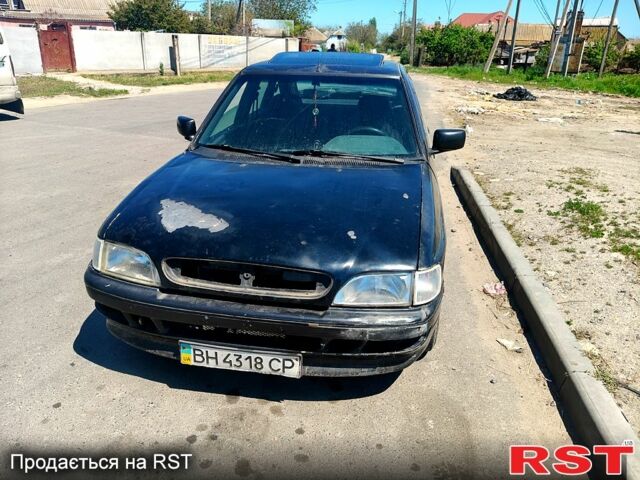 Черный Форд Эскорт, объемом двигателя 1.6 л и пробегом 130 тыс. км за 750 $, фото 1 на Automoto.ua