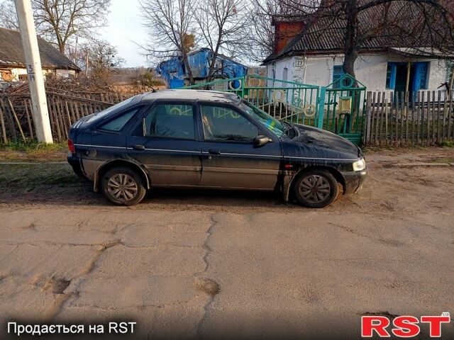 Чорний Форд Ескорт, об'ємом двигуна 1.3 л та пробігом 290 тис. км за 1200 $, фото 1 на Automoto.ua