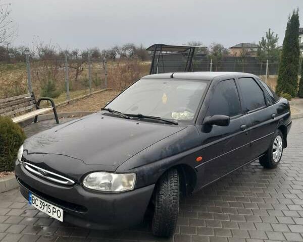 Черный Форд Эскорт, объемом двигателя 1.4 л и пробегом 350 тыс. км за 1450 $, фото 1 на Automoto.ua