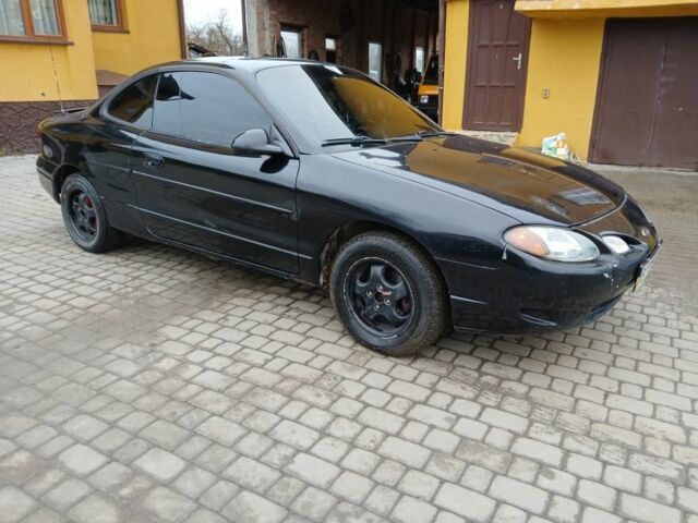 Черный Форд Эскорт, объемом двигателя 2 л и пробегом 149 тыс. км за 2200 $, фото 1 на Automoto.ua