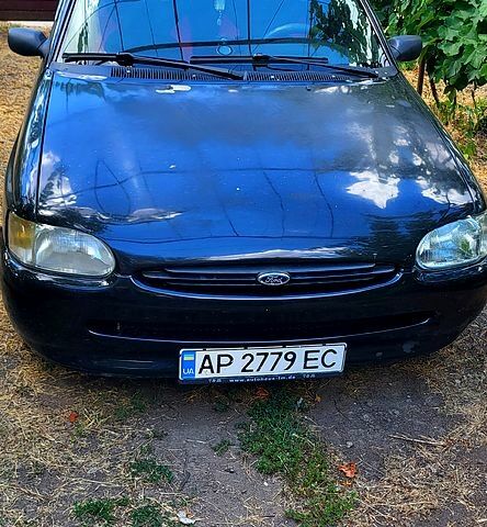 Чорний Форд Ескорт, об'ємом двигуна 1.6 л та пробігом 350 тис. км за 2200 $, фото 1 на Automoto.ua
