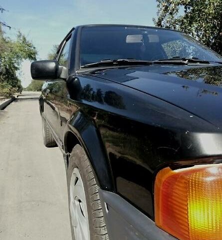 Черный Форд Эскорт, объемом двигателя 1.3 л и пробегом 100 тыс. км за 2100 $, фото 1 на Automoto.ua