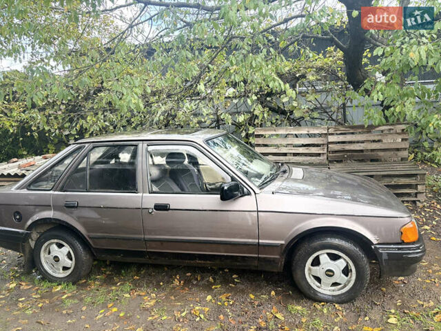 Коричневый Форд Эскорт, объемом двигателя 1.6 л и пробегом 99 тыс. км за 799 $, фото 1 на Automoto.ua