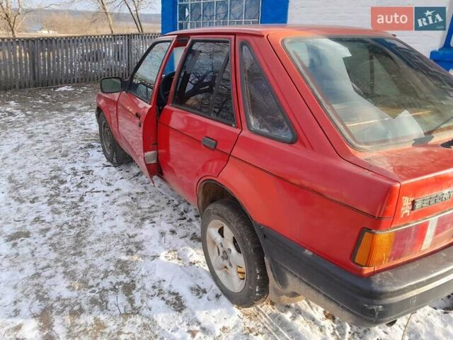 Красный Форд Эскорт, объемом двигателя 1.4 л и пробегом 888 тыс. км за 815 $, фото 1 на Automoto.ua