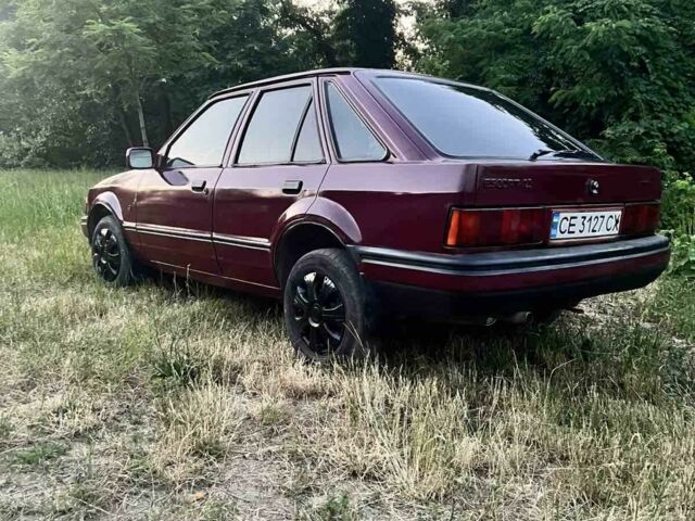 Красный Форд Эскорт, объемом двигателя 1.3 л и пробегом 200 тыс. км за 750 $, фото 1 на Automoto.ua