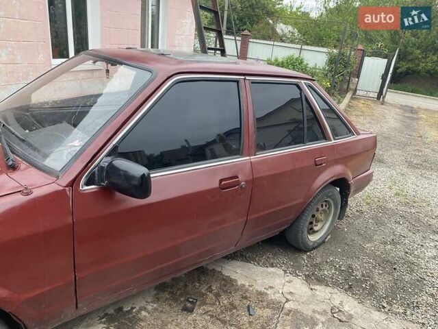 Красный Форд Эскорт, объемом двигателя 1.6 л и пробегом 100 тыс. км за 700 $, фото 1 на Automoto.ua