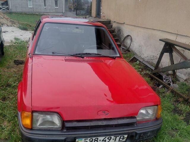 Червоний Форд Ескорт, об'ємом двигуна 1.8 л та пробігом 370 тис. км за 250 $, фото 1 на Automoto.ua
