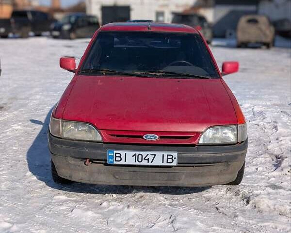 Красный Форд Эскорт, объемом двигателя 1.6 л и пробегом 150 тыс. км за 500 $, фото 1 на Automoto.ua