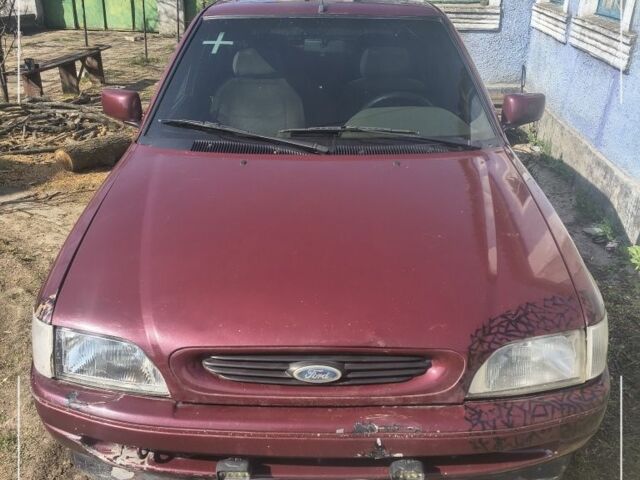 Червоний Форд Ескорт, об'ємом двигуна 1.4 л та пробігом 250 тис. км за 1174 $, фото 1 на Automoto.ua