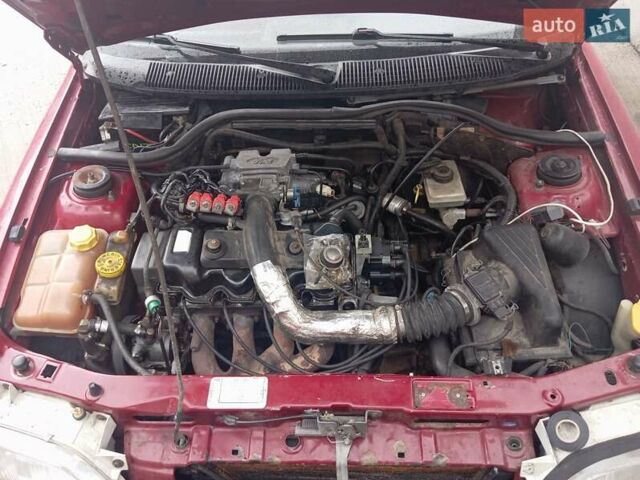 Красный Форд Эскорт, объемом двигателя 1.39 л и пробегом 997 тыс. км за 1333 $, фото 1 на Automoto.ua