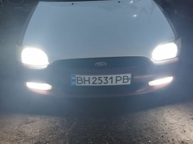 Червоний Форд Ескорт, об'ємом двигуна 1.6 л та пробігом 400 тис. км за 1300 $, фото 1 на Automoto.ua