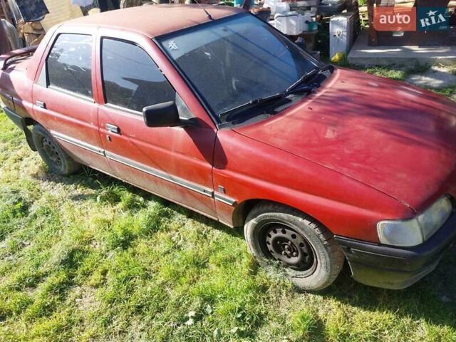 Красный Форд Эскорт, объемом двигателя 1.4 л и пробегом 150 тыс. км за 1000 $, фото 1 на Automoto.ua