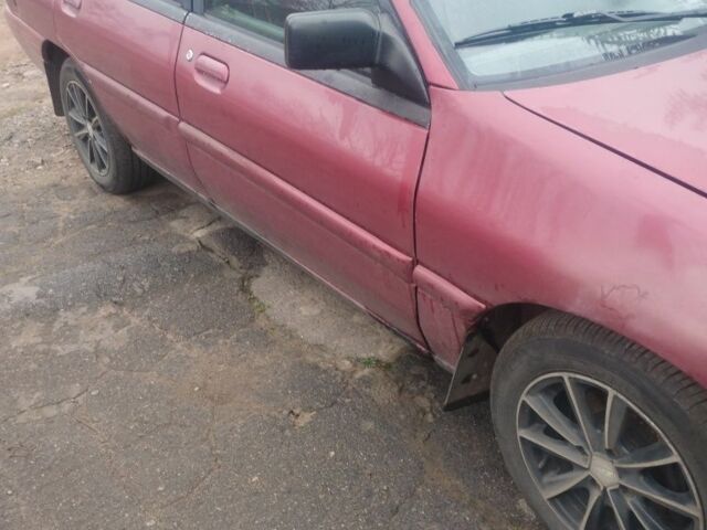 Красный Форд Эскорт, объемом двигателя 1.9 л и пробегом 190 тыс. км за 994 $, фото 1 на Automoto.ua