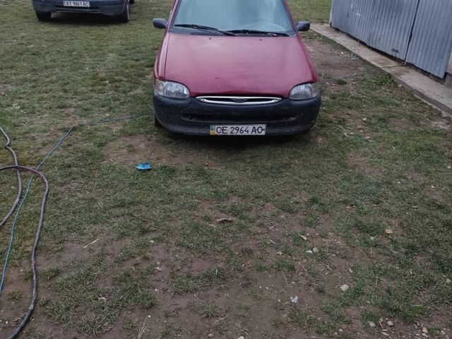 Красный Форд Эскорт, объемом двигателя 1.4 л и пробегом 300 тыс. км за 499 $, фото 1 на Automoto.ua