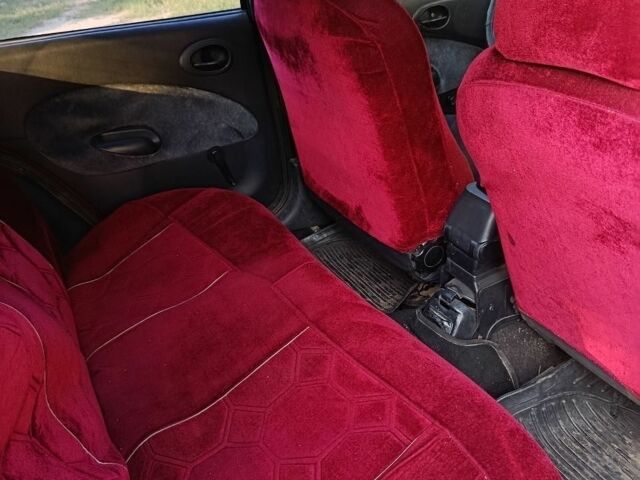 Красный Форд Эскорт, объемом двигателя 1.8 л и пробегом 400 тыс. км за 901 $, фото 1 на Automoto.ua