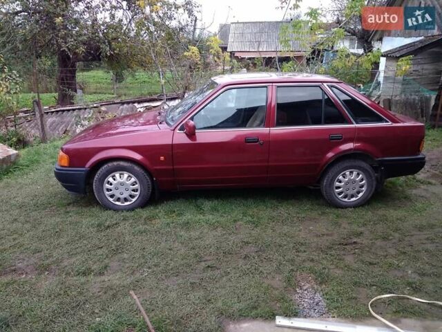 Червоний Форд Ескорт, об'ємом двигуна 1.39 л та пробігом 93 тис. км за 1325 $, фото 1 на Automoto.ua