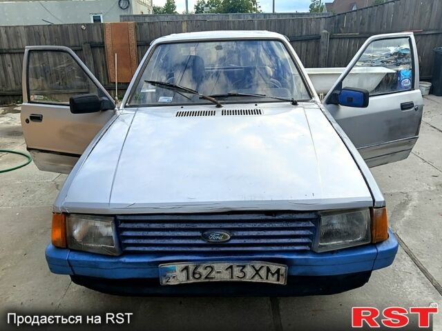 Сірий Форд Ескорт, об'ємом двигуна 1.4 л та пробігом 99 тис. км за 333 $, фото 1 на Automoto.ua