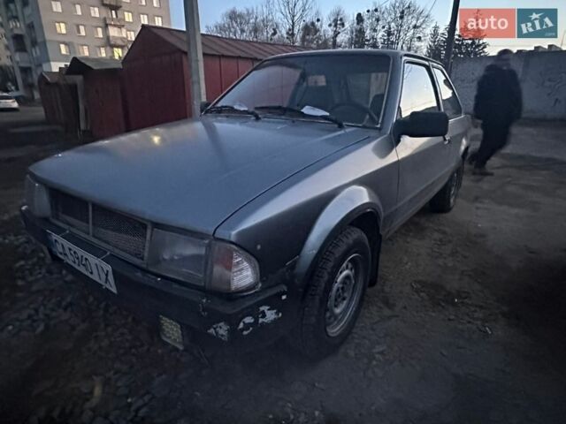 Серый Форд Эскорт, объемом двигателя 1.39 л и пробегом 200 тыс. км за 850 $, фото 1 на Automoto.ua
