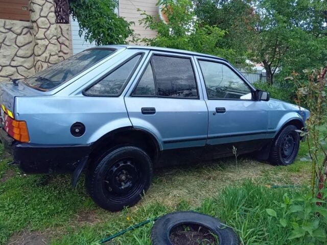 Серый Форд Эскорт, объемом двигателя 1 л и пробегом 3 тыс. км за 345 $, фото 1 на Automoto.ua