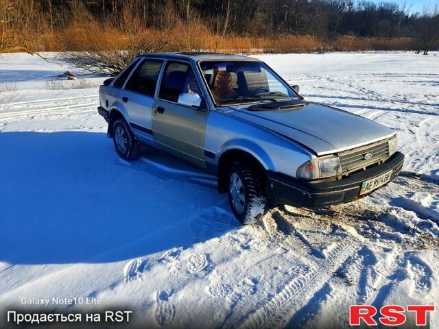 Серый Форд Эскорт, объемом двигателя 1.8 л и пробегом 0 тыс. км за 750 $, фото 1 на Automoto.ua