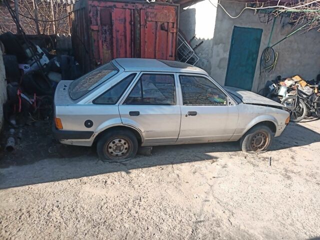 Сірий Форд Ескорт, об'ємом двигуна 1.1 л та пробігом 280 тис. км за 226 $, фото 1 на Automoto.ua