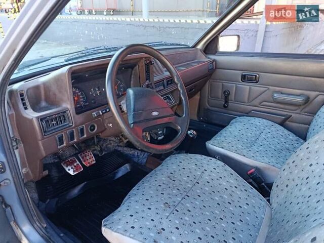 Серый Форд Эскорт, объемом двигателя 1.6 л и пробегом 320 тыс. км за 1500 $, фото 1 на Automoto.ua