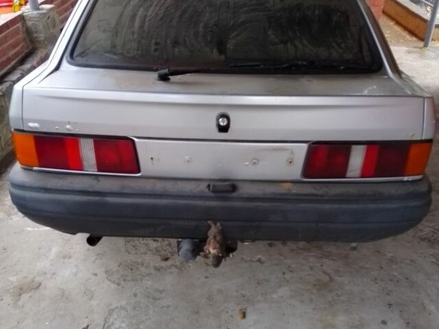 Сірий Форд Ескорт, об'ємом двигуна 1.4 л та пробігом 300 тис. км за 400 $, фото 1 на Automoto.ua