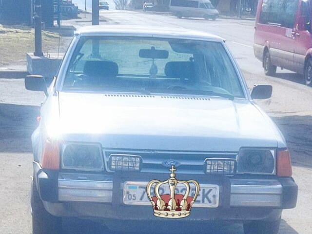 Серый Форд Эскорт, объемом двигателя 2 л и пробегом 100 тыс. км за 801 $, фото 1 на Automoto.ua