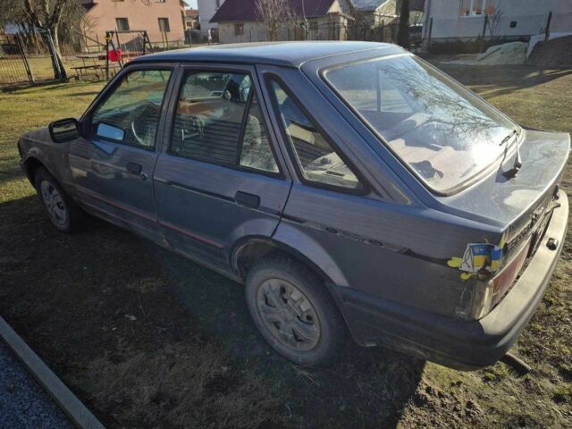 Сірий Форд Ескорт, об'ємом двигуна 1.4 л та пробігом 350 тис. км за 600 $, фото 1 на Automoto.ua