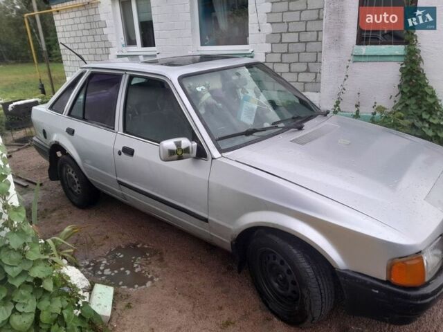 Серый Форд Эскорт, объемом двигателя 1.4 л и пробегом 354 тыс. км за 1000 $, фото 1 на Automoto.ua