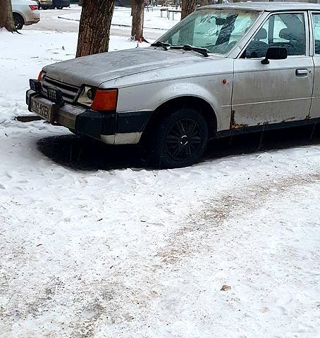 Сірий Форд Ескорт, об'ємом двигуна 1.6 л та пробігом 235 тис. км за 475 $, фото 1 на Automoto.ua