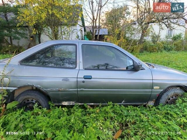 Серый Форд Эскорт, объемом двигателя 1.8 л и пробегом 320 тыс. км за 850 $, фото 1 на Automoto.ua