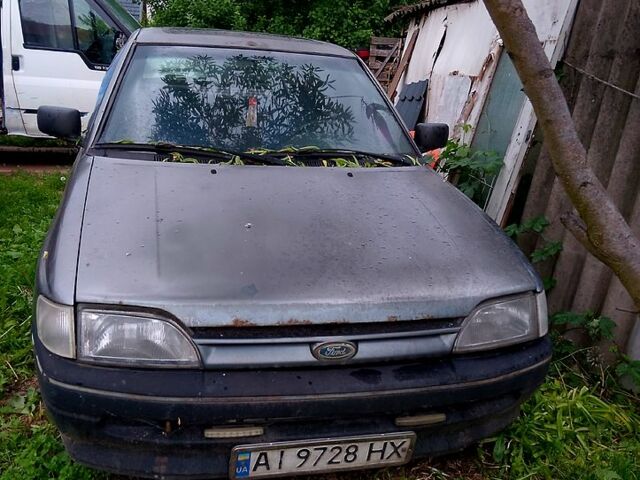 Сірий Форд Ескорт, об'ємом двигуна 1.4 л та пробігом 250 тис. км за 700 $, фото 1 на Automoto.ua