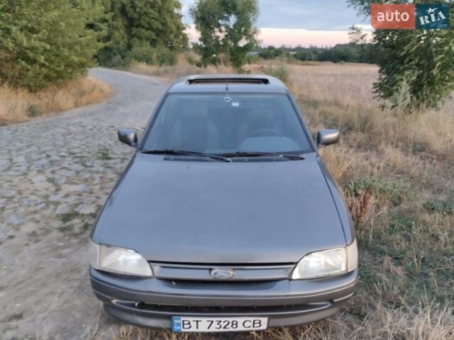 Серый Форд Эскорт, объемом двигателя 1.4 л и пробегом 231 тыс. км за 1800 $, фото 1 на Automoto.ua