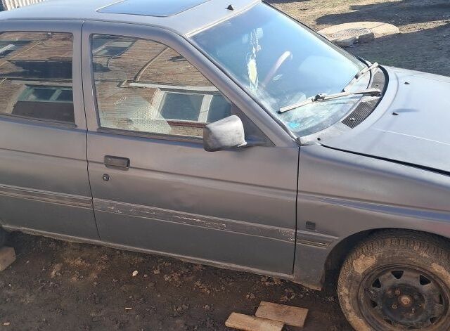 Серый Форд Эскорт, объемом двигателя 1.4 л и пробегом 300 тыс. км за 461 $, фото 1 на Automoto.ua