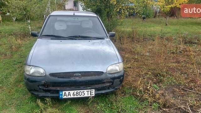 Серый Форд Эскорт, объемом двигателя 1.3 л и пробегом 1114 тыс. км за 1800 $, фото 1 на Automoto.ua