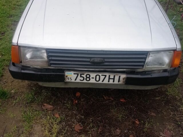 Сірий Форд Ескорт, об'ємом двигуна 1 л та пробігом 300 тис. км за 592 $, фото 1 на Automoto.ua