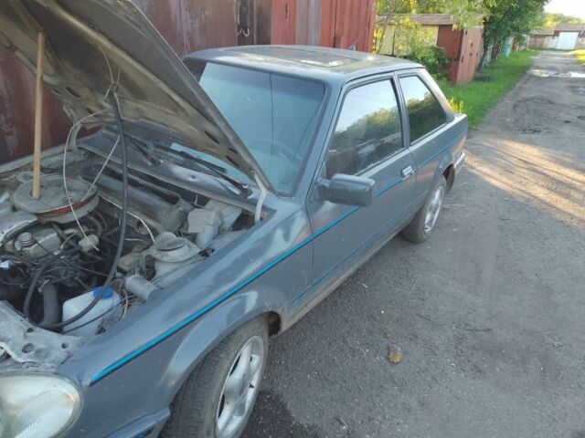 Серый Форд Эскорт, объемом двигателя 1 л и пробегом 45 тыс. км за 218 $, фото 1 на Automoto.ua